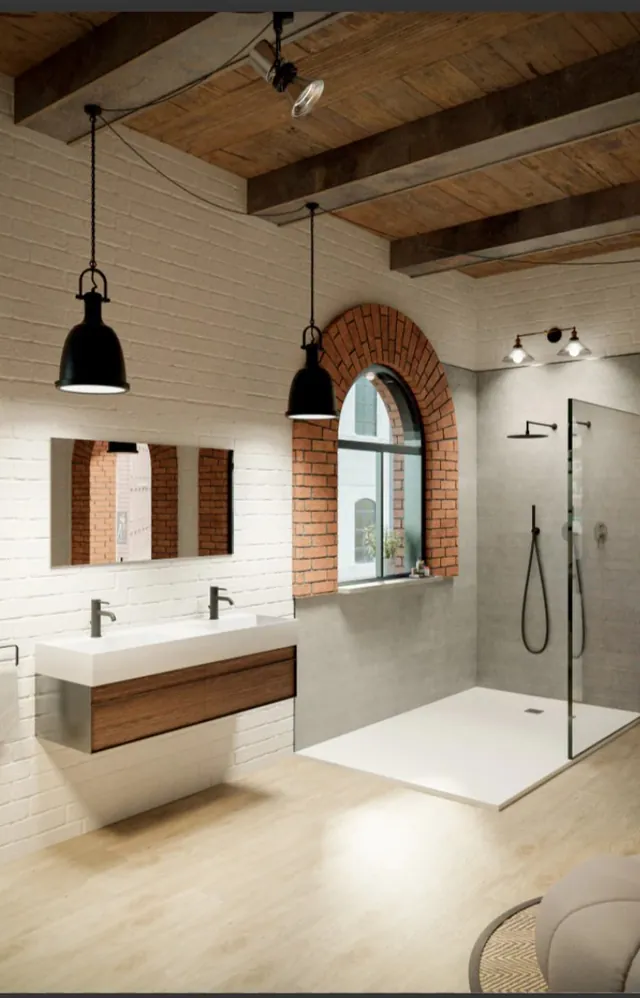 Baño de estilo loft con ladrillo visto blanco, arco de ladrillo rojo y mampara de ducha a ras de suelo